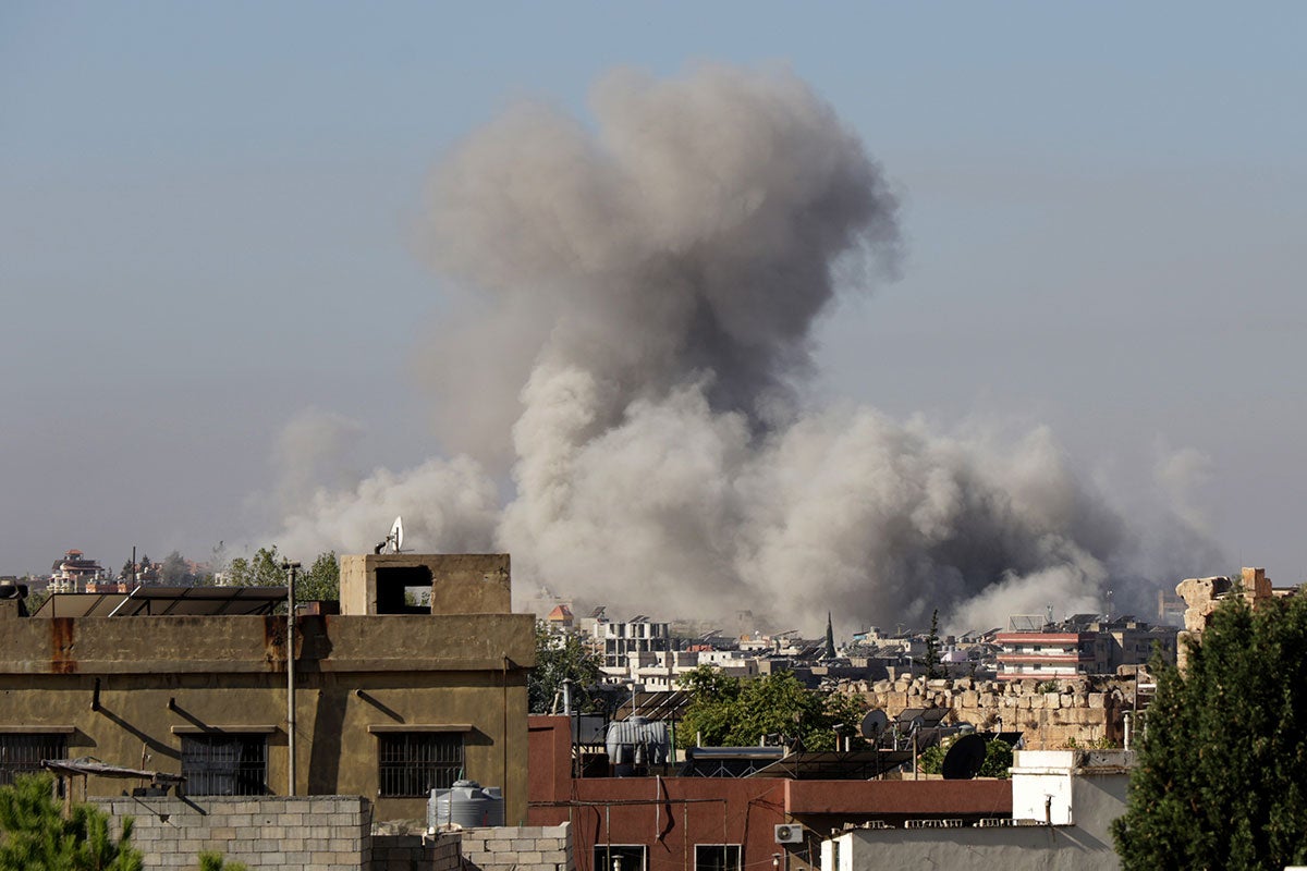 Smoke rises from the site of an airstrike in the Lebanese city of Baalbeck, located in the Bekaa Valley, on 28 September 2024.