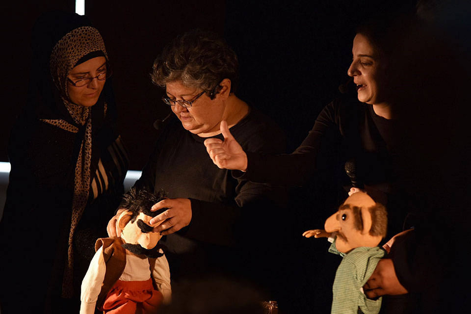 Women participating in the puppet performance in Majdel Anjar municipality. Photo: Abaad