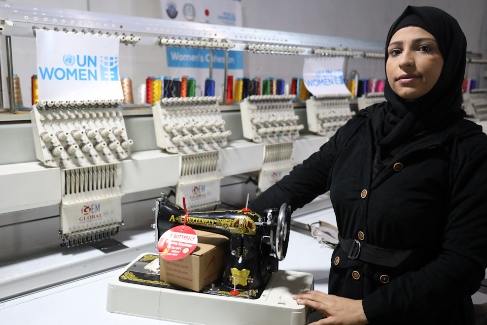 Trainee Amal Sayyed received a sewing machine as part of her certification. Photo: UN Women/Dar Al Mussawir.