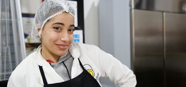 Marina Khamouny, 24, at Access Kitchen, a UN Women-funded community kitchen in Mar Mikhael, Beirut. Photo: UN Women/Lauren Rooney